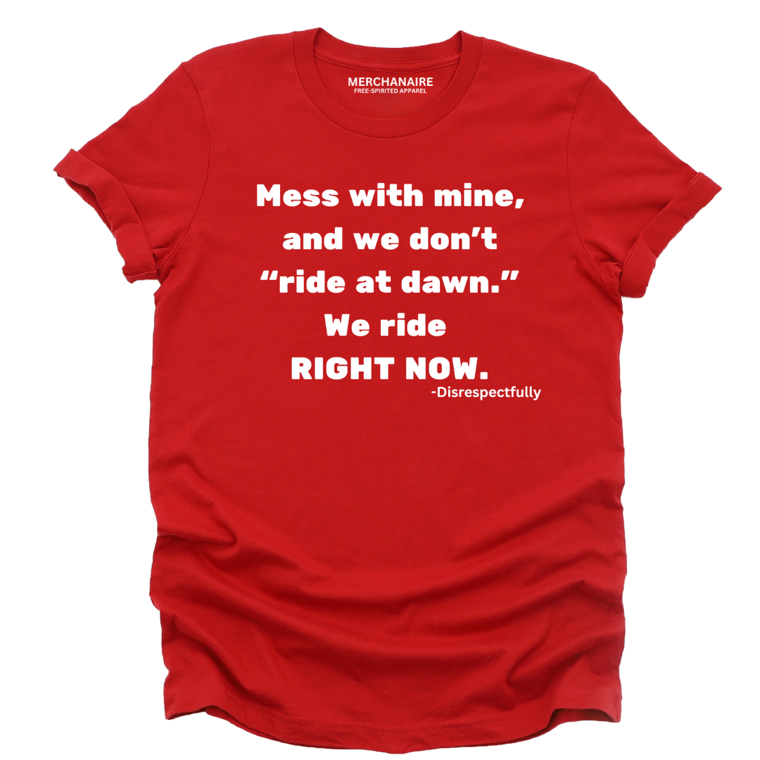 Red t-shirt featuring bold text: ‘Mess with mine and we don’t ride at dawn, we ride right now.’ This protective and empowering design is perfect for those who celebrate melanin pride, unity, and unapologetic strength. Ideal for casual wear, statement clothing, and making a bold impression.