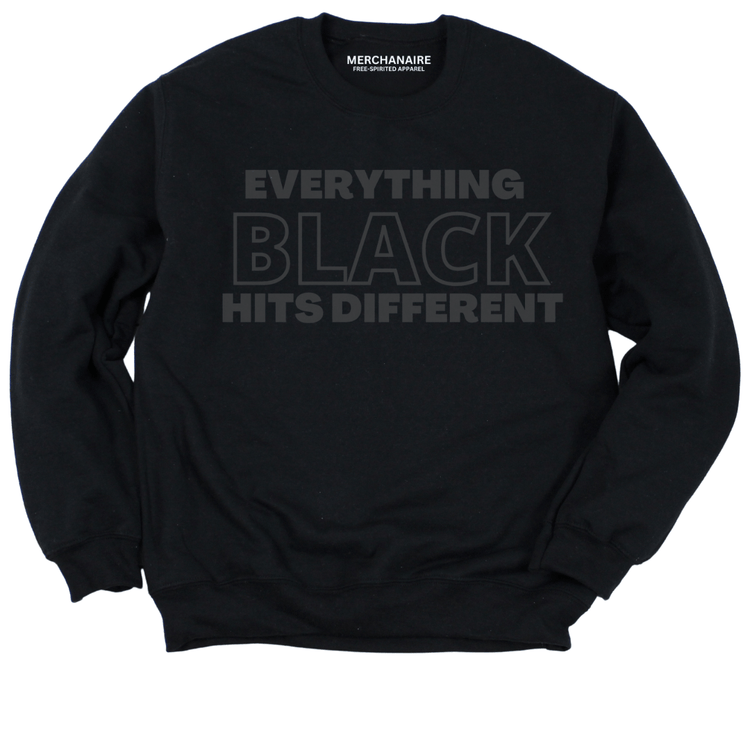 EVERYTHING BLACK HITS DIFFERENT SWEATSHIRT - Black with black letters Sweatshirt Merchanaire