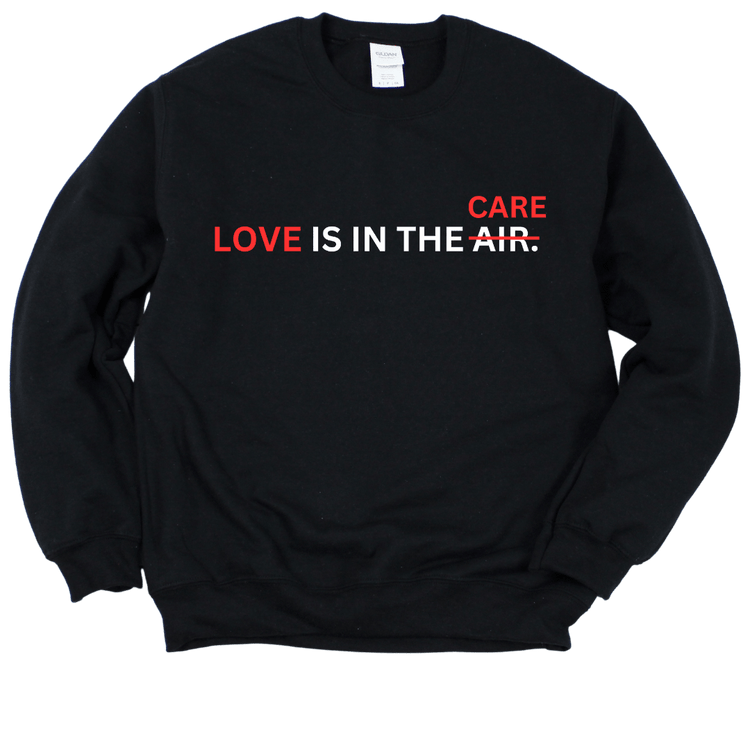LOVE IS IN THE CARE CREWNECK - BLACK SWEATSHIRT Merchanaire