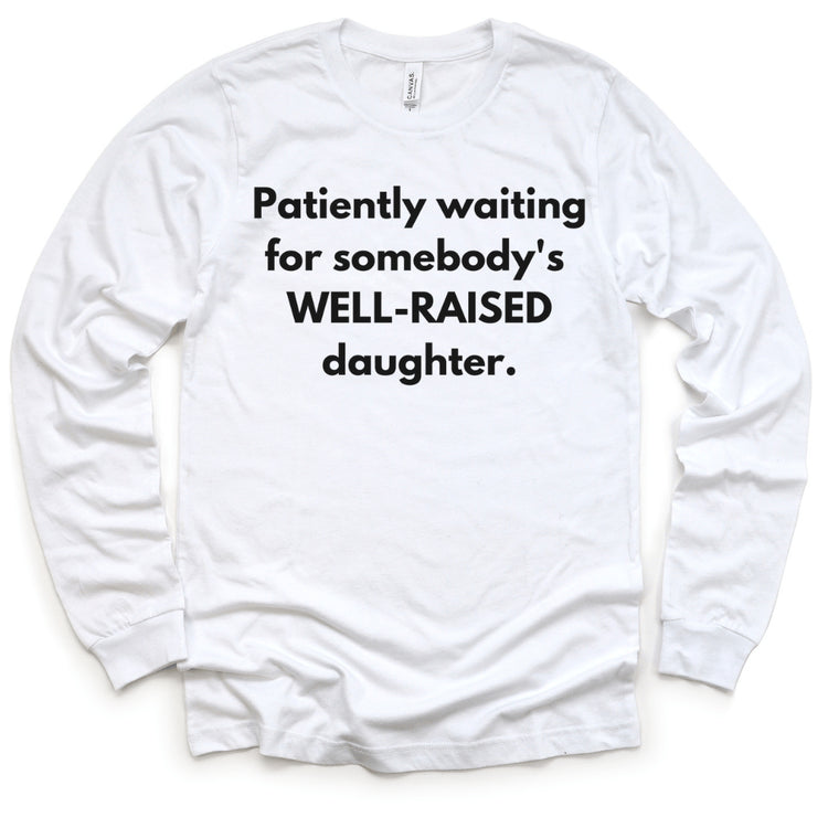 PATIENTLY WAITING FOR SOMEBODY'S WELL - RAISED DAUGHTER LONG SLEEVE - WHITE LONG SLEEVE T - SHIRT Merchanaire